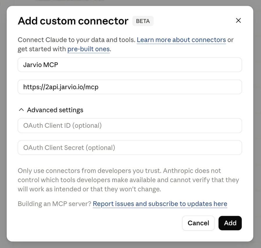 Claude.ai's Add custom connector dialog (beta) filled in with Name 'Jarvio MCP' and URL 'https://2api.jarvio.io/mcp', with the Advanced settings section expanded but OAuth Client ID and Client Secret left blank