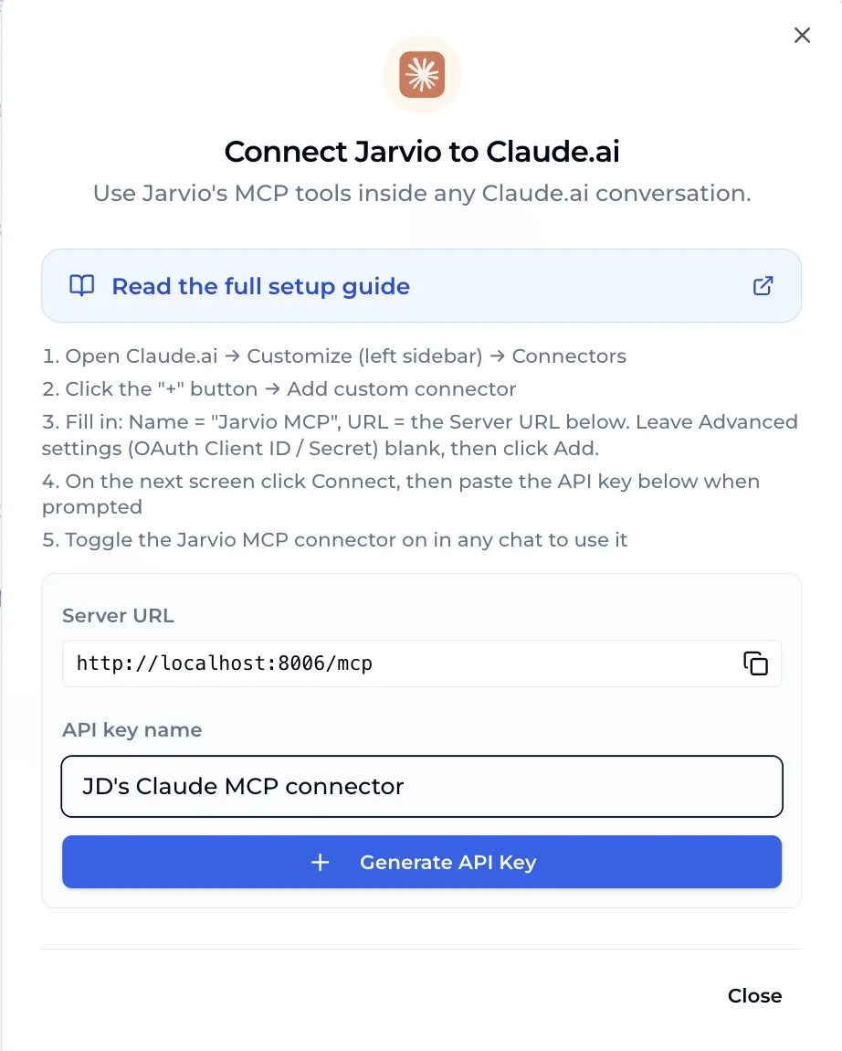 Jarvio's Connect-Jarvio-to-Claude.ai setup dialog — Claude orange-sunburst icon at the top, 'Read the full setup guide' link, 5 inline numbered steps mirroring Steps 2–4 of this article, the Server URL field, an API key name input pre-populated with 'JD's Claude MCP connector', and a blue Generate API Key button